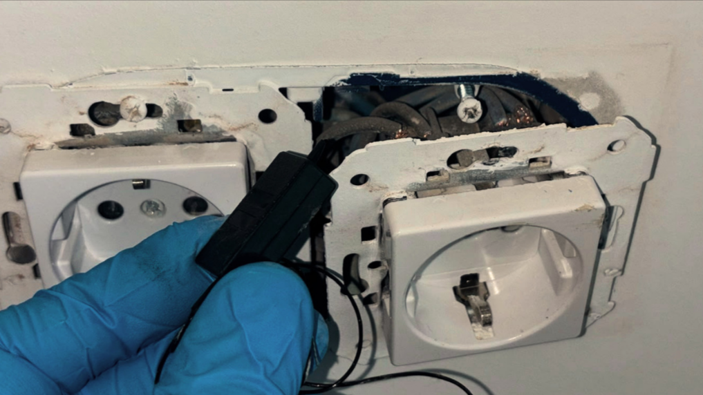 Specialist inspecting a meeting room for hidden cameras in Cyprus